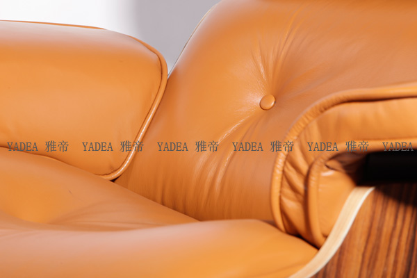 橙色核桃木贴皮的伊姆斯休闲椅（Walnut Eames Lounge Chair In Orange Leather）