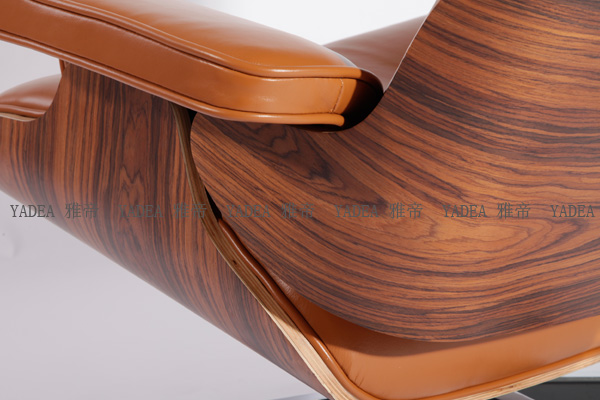 橙色核桃木贴皮的伊姆斯休闲椅（Walnut Eames Lounge Chair In Orange Leather）